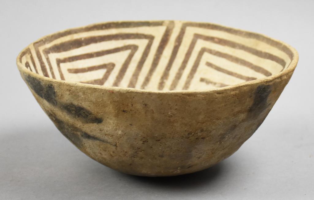 1200-1300 AD Anasazi Mesa Verde Black on White Bowl: This stunning piece of pottery is of Anasazi culture dating from 1200-1300 AD. Mesa Verde black triangular coils on white. Measures approx 3.5" tall x 8" wide. NOTE: From the collection of Daniel Cutr