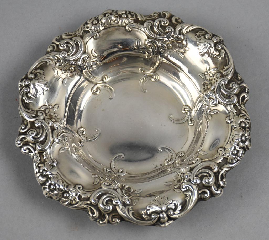Mid 20th Century Gorham Sterling Bon Bon Bowl: This is gorgeous, solid sterling silver from Gorham. Relief designs around rim of flowers and shells and accent scrolls. Mark on bottom indicates it is from the 20th century with the pentagon style im