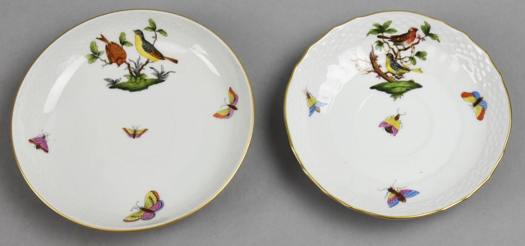 Pair Herend Rothschild Saucers, Two Sizes: These are pretty saucers in the Rothschild pattern by Herend. Each is a bird motif accented with butterflies. One saucer is 5.5" and the other for the over sized cup is 6" across.