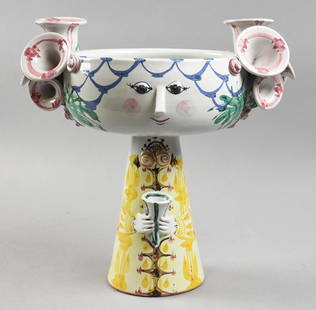 1965 Bjorn Wiinblad (1918-2006 Denmark) Figural Planter: This is an adorable ceramic planter created by Danish artist Bjorn Wiinblad (1918-2006). Figural woman hand painted with dress being the pedestal base. She is signed and dated (19)65. Stands approx 12