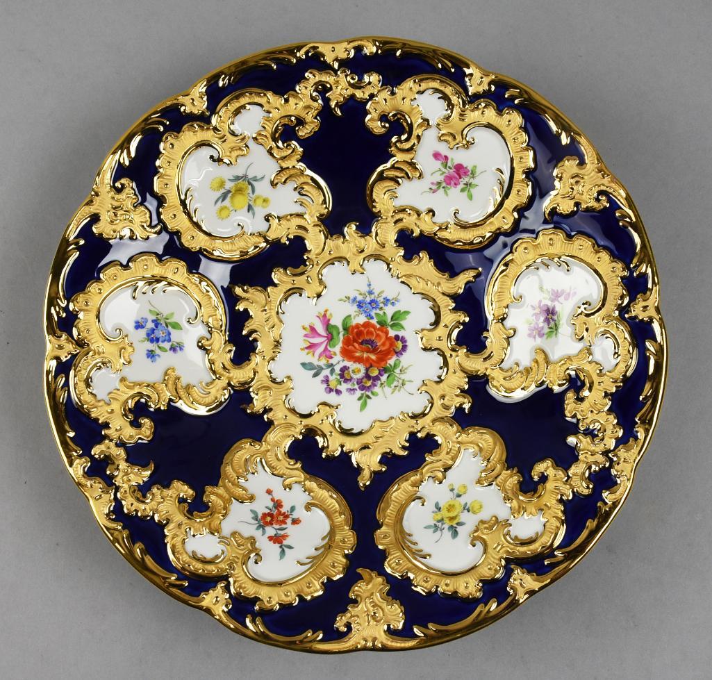 1934-1945 Meissen Porcelain Cobalt & Gold Gilt Floral Plate: This is a stunning piece of Meissen porcelain. Rich cobalt glaze and gold gilt C scrolls with hand painted floral accents. Well marked on the back, appears to be the mark used from 1934 to 1945. Piece