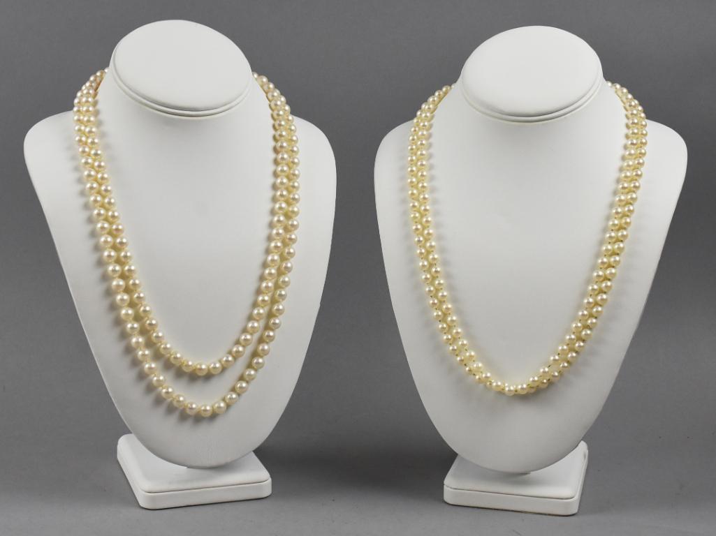 Pair Vintage Pearl Necklaces, Double Strand, 14K Clasp: Beautiful pair of pearl necklaces, one being a double strand with an ornate 14K clasp set with diamonds. Matinee pearl strand are 7MM and measures approx 22" long. The other is a very long rope strand