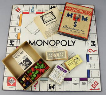 c1930 Parker Brothers Monopoly Game: Great looking vintage Monopoly game from the mid 1930s. Set appears complete with game board, money, property cards and Community Chest cards, Chance cards and wooden houses, hotels and game pieces.