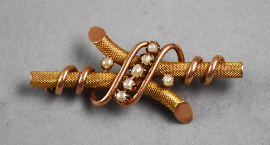 Antique 10K Yellow, Rose Gold and Baroque Pearl Brooch: Antique 10K Yellow, Rose Gold and Baroque Pearl Brooch This is a lovely antique brooch in 10K yellow gold, wrapped in rose gold. The wrap is set with baroque pearls. Pin is has C clasp, no visible mar