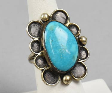 Vintage Navajo Sterling and Turquoise Ring SIZE: Pretty vintage sterling silver ring with nice polished turquoise stone. It is Navajo and unsigned. Overall approx weight 6g. Native American.