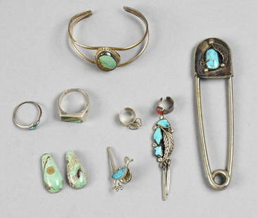 Vintage Native American + Sterling/Turquoise Jewelry: Lot is a nice assortment of mostly Native American jewelry with a Risdon Key-Tag, ear cuff from Ben Eustace and more. Includes two loose pieces of turquoise in a teardrop shape. Overall approx weight