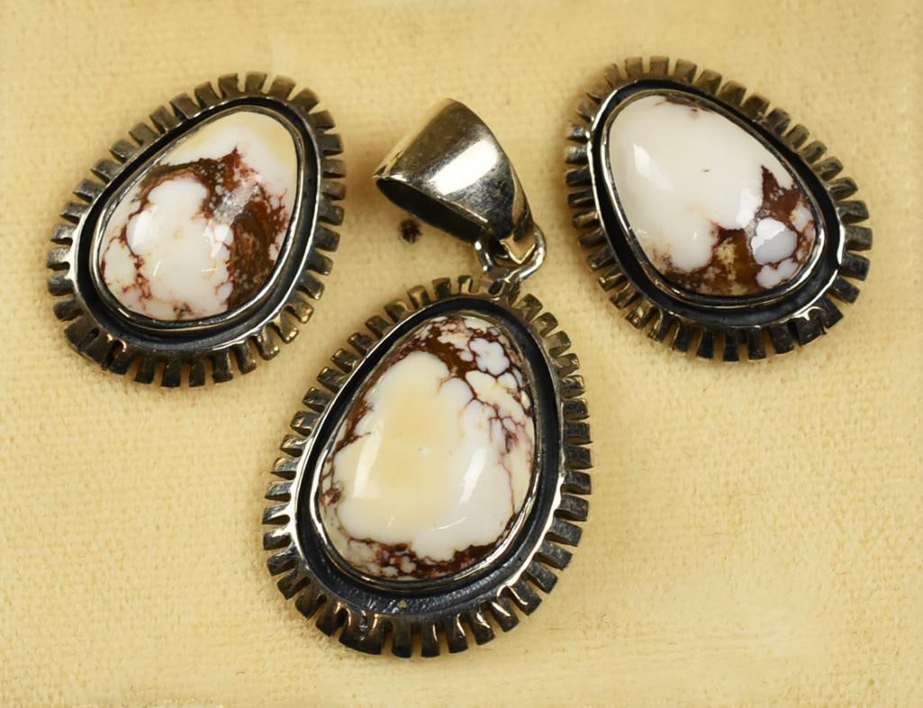 Vintage Buffalo Jasper Pendant & Earrings Set Marked: Lovely set of a pendant with matching earrings. Each piece of polished buffalo jasper is set in jagged sterling silver. The pendant has a faint mark, believed to be Jackson Seckletstewa and all piece
