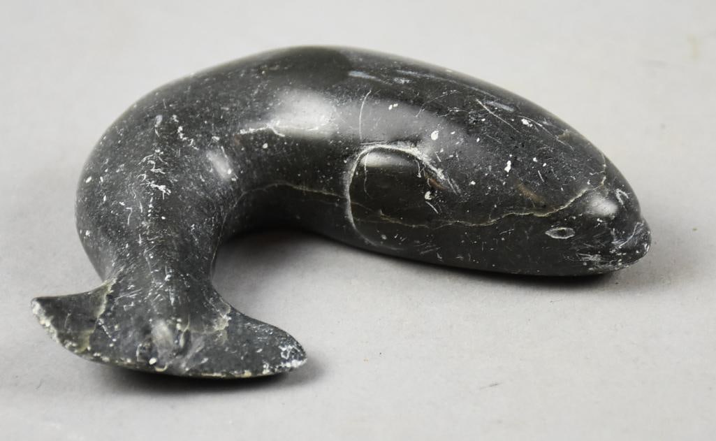 Vintage Inuit Carved Soapstone Whale Figurine: This cool piece may be even older than vintage. It appears to be soapstone and of Alaskan origin. Appears hand carved in the form of a whale. No visible marks and measures approx 4.5".