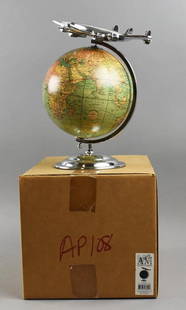 Authentic Model On Top of the World Replica Globe/Plane: Great looking Authentic Models of the Netherlands Globe with airplane. This is a replica Weber Costello with a Lockheed airplane on top, model number AP108. Stands approx. 12" tall x 10.5" wide