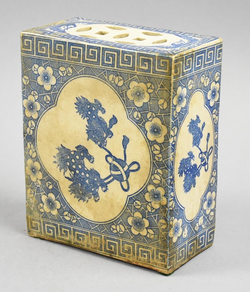 Antique Chinese Porcelain Blue and White Opium Pillow: Gorgeous porcelain is Chinese. This is a blue and white block opium pillow. Center medallions are Foo lions with blue and white flowers with geometric shapes. No visible marks and measures 6" tall