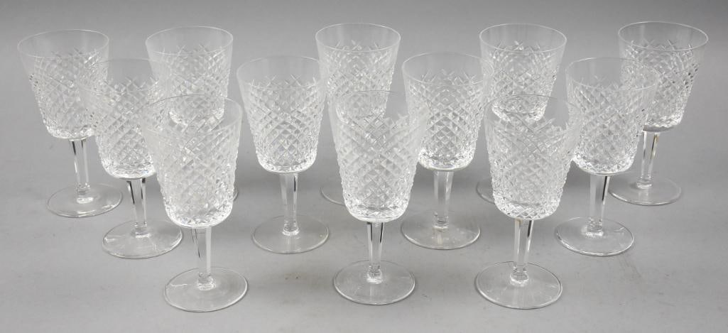 (12) 1952-2022 Waterford Crystal Alana Wine Glass Stems: Lot of 12 Waterford Crystal stems in the Alana pattern that ran from 1952-2022. These wine glasses stand approx. 7" tall.