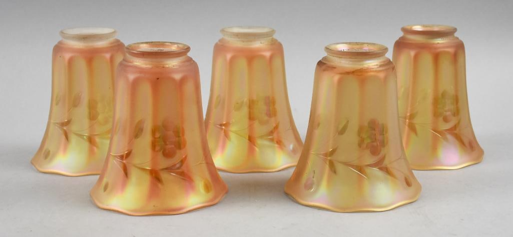 c1920 NuArt Marigold Glass Shades w/ Flower Motif: These are beautiful carnival type glass shades are from NuArt. They are marigold in color with flower, stem and leaf motif. They are well marked and are all approx. 5" tall x 5" wide, fitters measure 