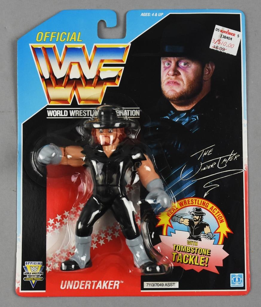 WWF Undertaker w/ Tombstone Tackle - Carded - NOS: Hasbro WWF Undertaker w/ Tombstone Tackle - Carded - NOS. From the home of the largest toy collector on the west coast.