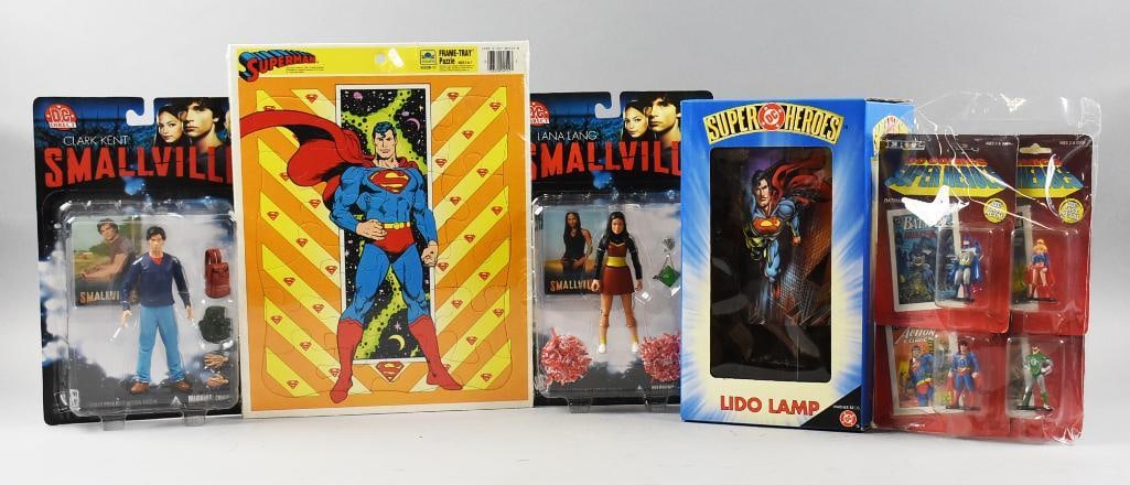 Superman, Super Heroes, Smallville Action Figs-Mint-NOS: Superman, Super Heroes, Smallville Action Figures-Mint in Packages-NOS. Lot are Smallville characters Lana Lang and Clark Kent, Superman puzzle, Superman super heroes Lido Lamp and four Ertl Super He