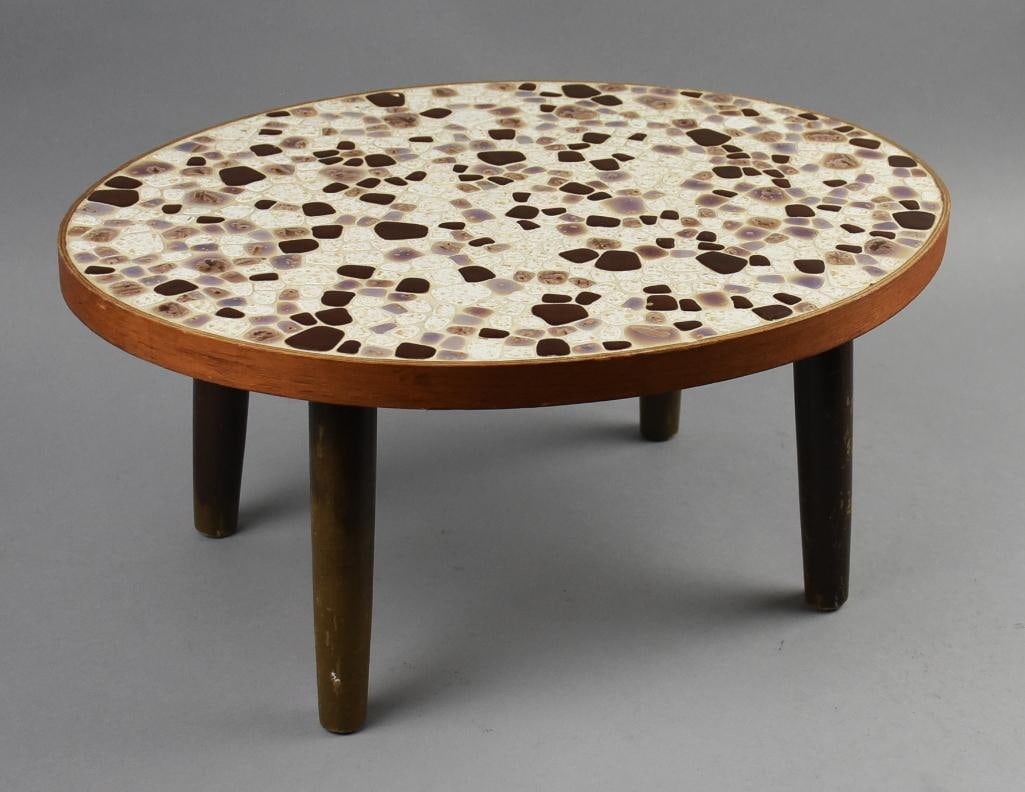 Mid Century Pebble Low Table/Plant Table MCM: This very cool piece is a mid century table inlaid with pebbles framed by the outer band that appears teak. No visible marks or labels and measures approx. 9" tall x 15" x 19". MCM