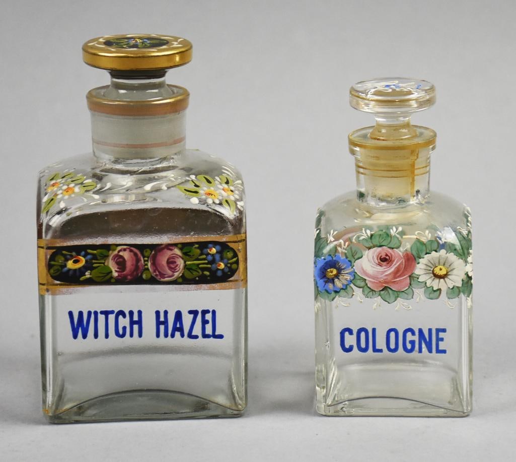 Antique Apothecary Glass Bottles/Whitall & Tatum Co: These are very pretty apothecary bottles with floral details hand painted in enamel. The larger of the two for Witch Hazel has flowers with a black background and black and gold stopper. The Cologne b