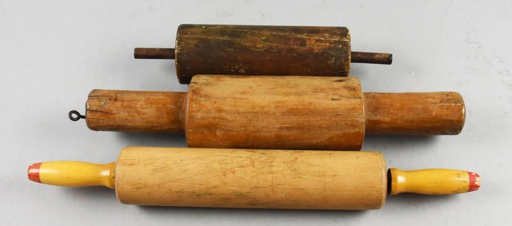 Primitive Antique & Vintage Rolling Pin Grouping: These are three very fun vintage and antique rolling pins. Two are primitive and appear hand crafted, both with nice patinas. The largest is vintage, yellow and red handles. Measure from 11" to 18" lo