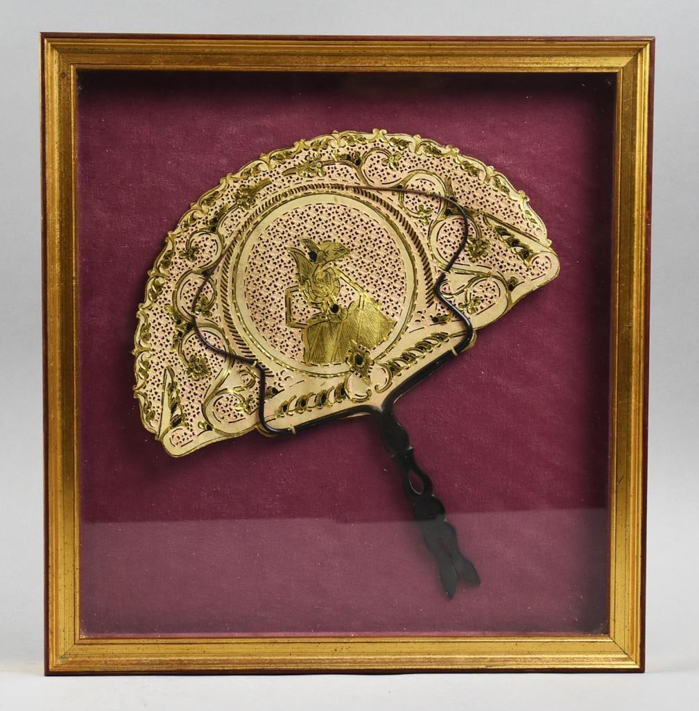 Antique Indonesian Vellum Fan: Here we have a unique piece. This is a vintage Indonesian fan made of buffalo vellum and nicely presented in a shadow box frame. Measures approx. 13" x 14".