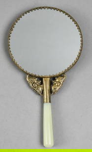 Antique Chinese Dragon & Eagle Mirror, Jade Handles: This very cool piece is of Chinese origin. Low relief silver-toned metal frame with a dragon and eagle facing each other an winged spandrels. Handle is smooth jade. No visible markings and measures ap