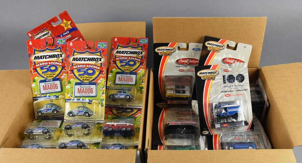 (63) Matchbox Across America & More, Carded - NOS: Lot is 63 Matchbox, 45 Across America with one 3 car pack; 11 Barrett Jackson; three 100 years of Ford; three larger scale Barrett Jackson and one Barrett Jackson in box, Carded - NOS. From the home o