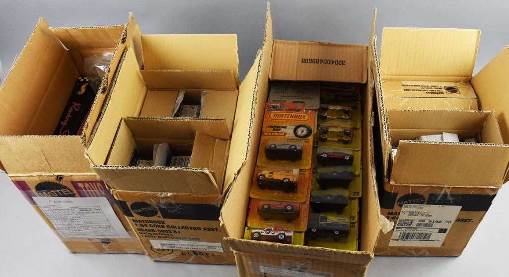 (105) Matchbox Coca Cola & More Die Cast, Carded-NOS: Approx 105 Matchbox Coca Cola & More Die Cast, Carded-NOS. Includes Collectibles Truck and Dragster, Lightning with case, yellow Ferrari, 40 Red Ferrari, 2 complete Happy Meal sets, and many others. F
