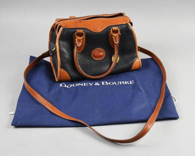 Dooney & Bourke Medium Hobo Purse, Dust Bag: This great purse is from designer Dooney & Bourke. It was purchased in 2005 and retains tags and receipt. Body is black pebbled letter with light brown trim and is called Medium Hobo. Measures approx.