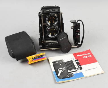 c1970 Mamiya C330 Professional Twin Lens Flex Camera: Very cool vintage Japanese camera, Mamiya C330 Professional. Camera is a twin lens flex with the original instruction brochure. Camera is equipped with Mamiya Sekor 80 mm lens. Viewing screen is clear