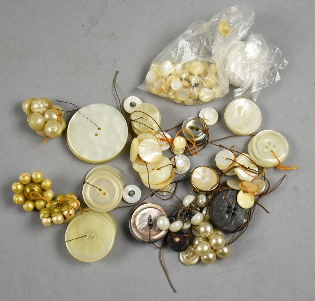 Misc. Vintage Mother of Pearl/Faux Pearl Buttons: Pretty assortment of vintage buttons in mother of pearl with a couple that are faux pearl. Great for updating your clothing or crafts. One might be an earring.