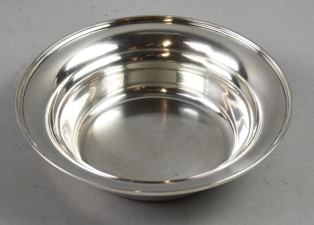 Vintage Baldwin & Miller Sterling Bowl - 474 Grams: Lovely vintage bowl attributed to Baldwin & Miller. Simple style stamped BM with a lion and sterling. Measures 10" across x 2.5" tall with an approx weight of 474gr.