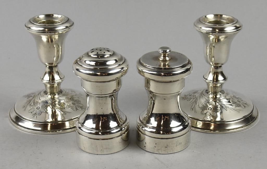 Vintage Empire and Lord Silver Sterling Table Pieces: Nice selection of sterling pieces for your dining table. Lot is a pair of salt and pepper shakers marked Empire Sterling and a pair of weighted Lord Silver sterling candlestick holders etched with flo
