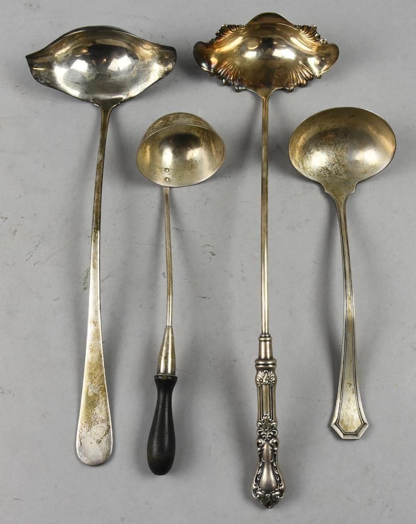 (4) Vintage Silver Plate Ladles, Reed & Barton & More: Pretty for display or use are these nice vintage silver plate ladles. Lot is Simeon & George Rogers, Reed and Barton and two unmarked, one with ebony handle. Measure from 11" to 17" long.