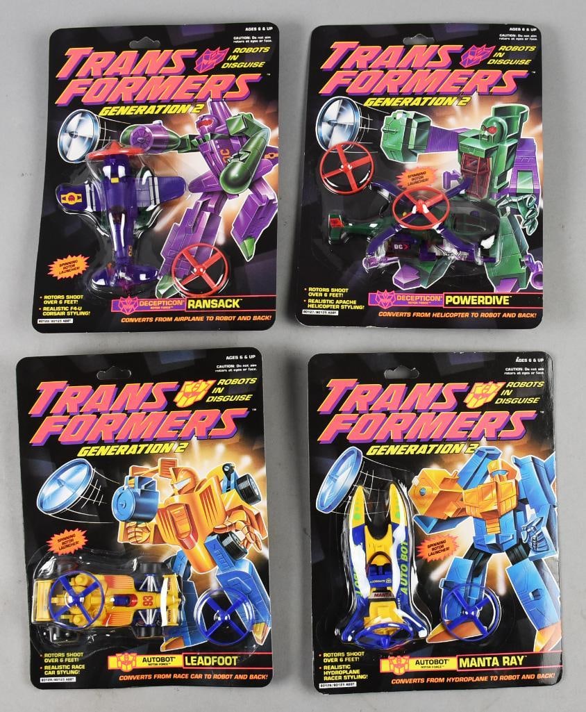 (4) 1994 Hasbro Transformers G2 Action Figures-MOC-NOS: Lot is four 1994 Hasbro Transformers G2 Action Figures-MOC-NOS. Consists of Ransack, Powerdrive, Manta Ray and Leadfoot. Single owner collection from the largest toy collector on the West Coast.