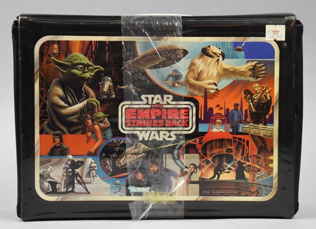 1981 Star Wars Empire Strikes Back Carrying Case - NOS: 1981 Star Wars Empire Strikes Back Carrying Case - NOS. It is number 39190 and has never been used. Retains factory plastic around middle and original label on back. Single owner collection from the l