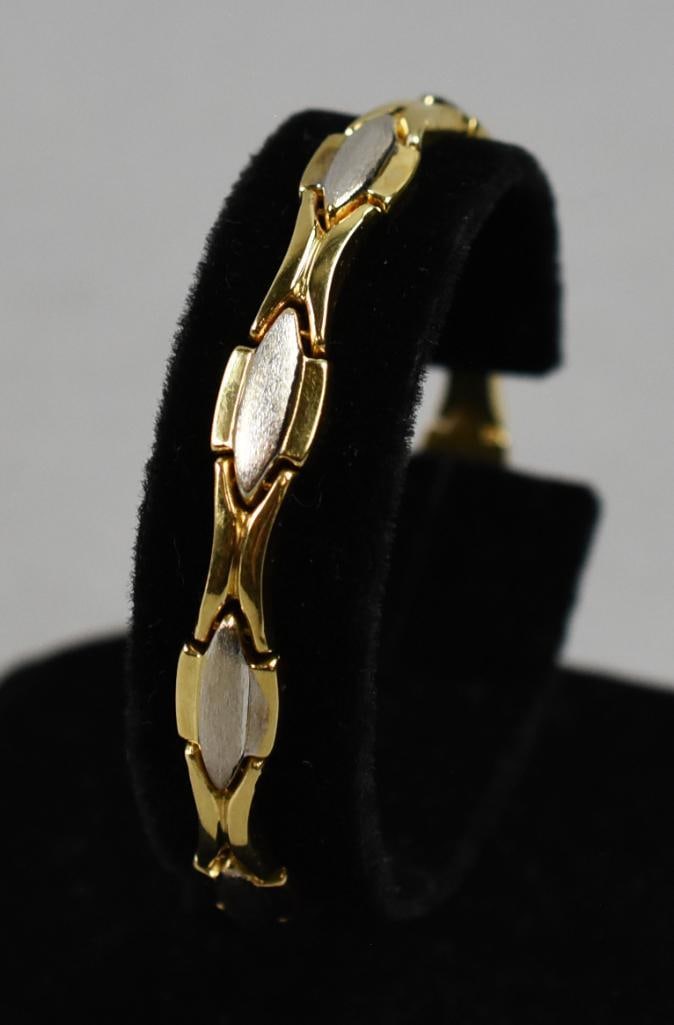 Hanna Weiss Co. 14K Yellow/White Gold Bracelet: Stunning Italian bracelet from Hanna Weiss Co. Both polished yellow gold links with brushed white gold insets. Locking clasp is marked HWC 14K. Overall approx weight 9.1gr. and 7" long. Beautiful piec