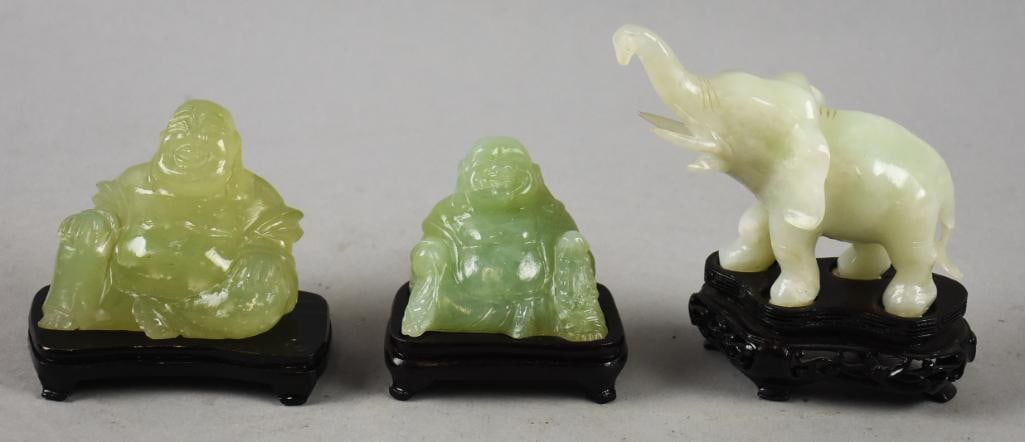 Vintage Mini Chinese Jade Laughing Buddha and Elephant: Fun assortment of vintage Chinese figurines. Each appears to be jade with their own custom rosewood stands. Lot is two Laughing Buddha and one elephant with trunk up for good luck. Overall measure fro