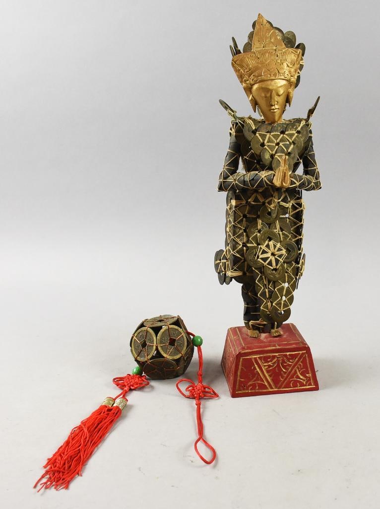 c1940 Balinese Chinese Coin Dewi Sri Statue: Awesome vintage Dewi Sri statue. The body appears wood with Chinese coins woven over. Figure is mounted to a carved and painted wooden base. Includes a coin ball, a symbol of prosperity. Statue is app