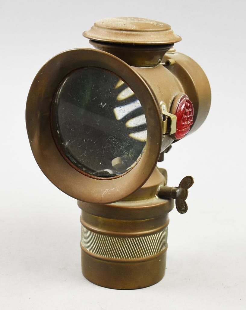 Antique German Balaco Carbide Bicycle Lamp: Very cool antique bicycle lamp is of German origin. It was manufactured by Balaco and appear solid brass. Clear glass front window with green and red inserts on each side and burner appears complete. 