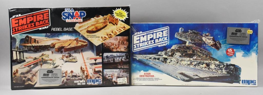(2) 1989, 1992 MPC Empire Strikes Back Snap Models-NOS: Lot is two 1989, 1992 MPC Empire Strikes Back Snap Models-NOS. Includes a Rebel Base and a Star Destroyer. Factory sealed boxes. Single owner collection from the largest toy collector on the West Coas