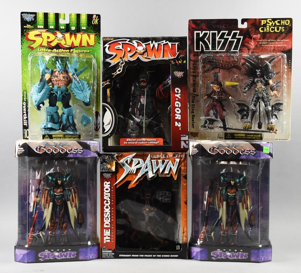 (6) 1998 McFarlane Spawn Action Figures-MIP-NOS: Lot is six 1998 McFarlane Spawn Action Figures-MIP-NOS. Includes two Goddess and one each Cy-Gor-2, Kiss (Gene Simmons), Manga Overtkill and Desacator. Single owner collection from the largest toy col