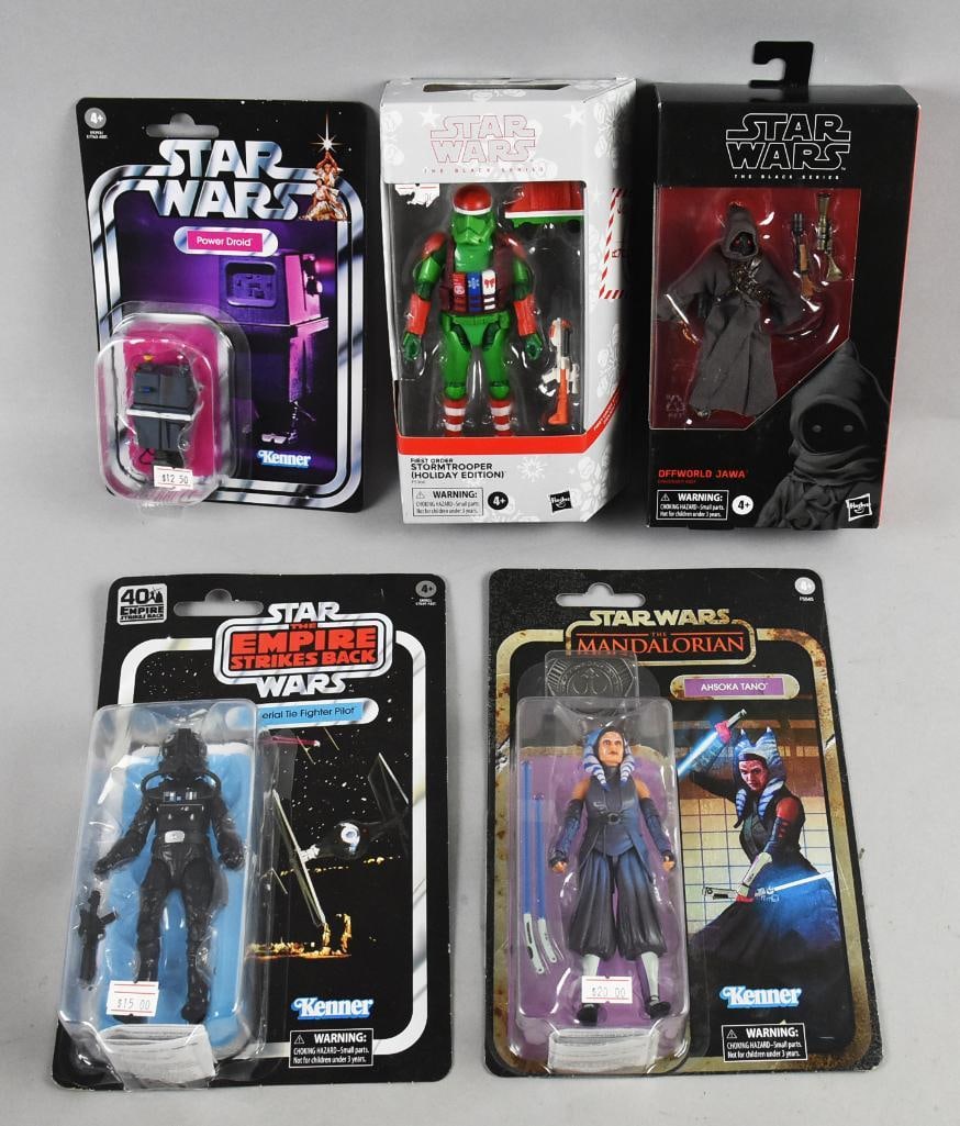 (5) 2019-22 Kenner/Hasbro Star Wars Action Figures-MIP: Lot is five 2019-22 Kenner/Hasbro Star Wars Action Figures-MIP. Figures are The Mandalorian, Off World Jawa, Power Droid, Storm Trooper Holiday Edition and Imperial Tie Fighter. From the home of a Sta