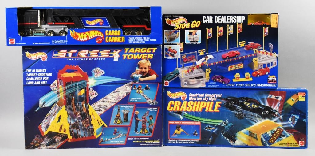 (4) 1991-94 Mattel Hot Wheels Playsets Plus-MIB-NOS: Lot is four 1991-94 Mattel Hot Wheels Playsets Plus-MIB-NOS. Includes Cargo Carrier, Sto & Go Car Dealership, Crashpile and Target Tower. Single owner collection from the largest toy collector on the