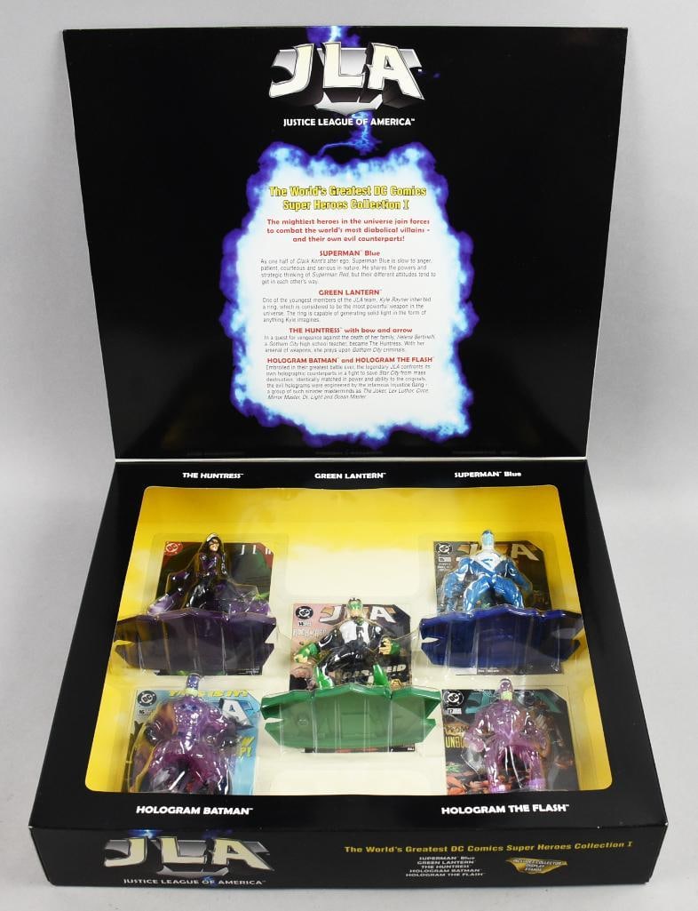 1998 Kenner Justice League of America 5 Pc Action Figure-NOS: 1998 Kenner Justice League of America 5 Pc Action Figure-NOS. Package contains Hologram Batman, Hologram The Flash, Superman (blue), Green Lantern and The Huntress with bow and arrow. Single owner col