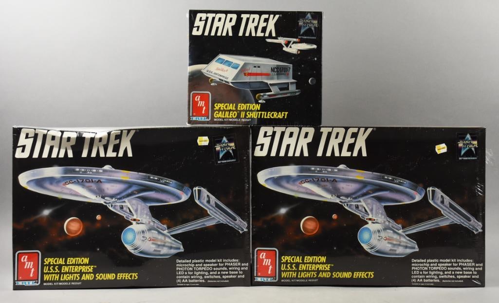 (3) 1991 AMT Ertl Star Trek Enterprise/Shuttlecraft-NOS: Lot is three 1991 AMT Ertl Star Trek with two Enterprise and one Shuttlecraft-NOS. Retain factory shrinkwrap. Single owner collection from the largest toy collector on the West Coast.