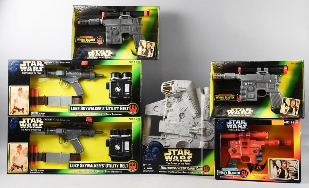 (6) 1996-97 Kenner Star Wars Weapons Plus-MIB-NOS: Lot is six 1996-97 Kenner Star Wars Weapons Plus-MIB-NOS. Lor includes a Millenium Falcon Carrying Case and an Electronic Heavy Blaster and two each Water Blaster and Luke Skywalker's Utility Belt. Si
