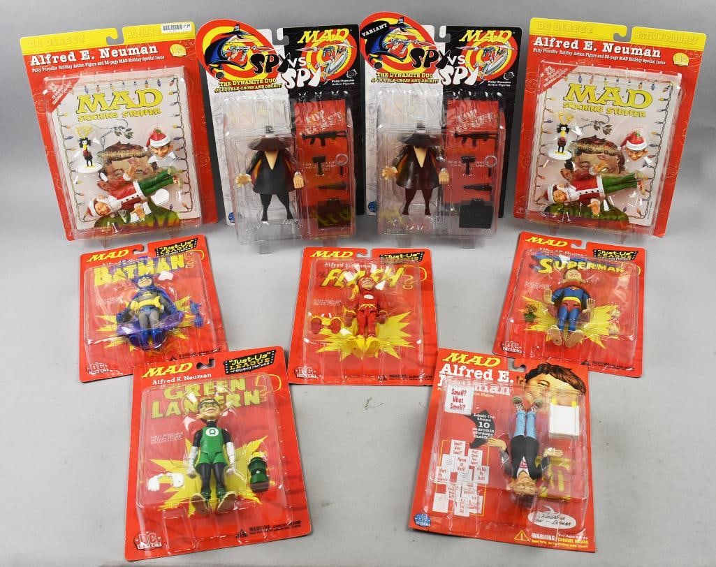 (9) DC Direct Mad Magazine Action Figures-MOC-NOS: Lot is nine DC Direct Mad Magazine Action Figures-MOC-NOS. Includes two Stocking Stuffers, Spy Vs Spy variant, Superhero Alfred's and poseable Alfred. Single owner collection from the largest toy coll