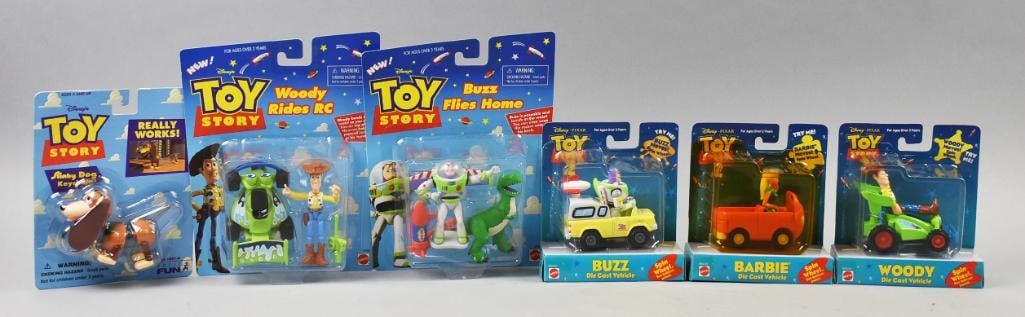 TOY STORY (6) 1996, 1999, 2000 Mattel/Basic Fun Figs-MIP-NOS: (6) 1996, 1999, 2000 Mattel/Basic Fun Toy Story Figs-MIP-NOS. Lot includes Slinky Dog, Woody Rides RC, Buzz Flies Home, and die cast Buzz, Barbie and Woody. Single owner collection from the largest to