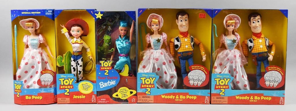 (5) 1999 Mattel Toy Story Dolls, Incl Barbie-NRFB-NOS: Lot is five 1999 Mattel Toy Story Dolls, Incl Barbie-NRFB-NOS. Includes Tour Guide Barbie, Bo Peep, Jessie and two Woody & Bo Peep double doll set. Single owner collection from the largest toy collect
