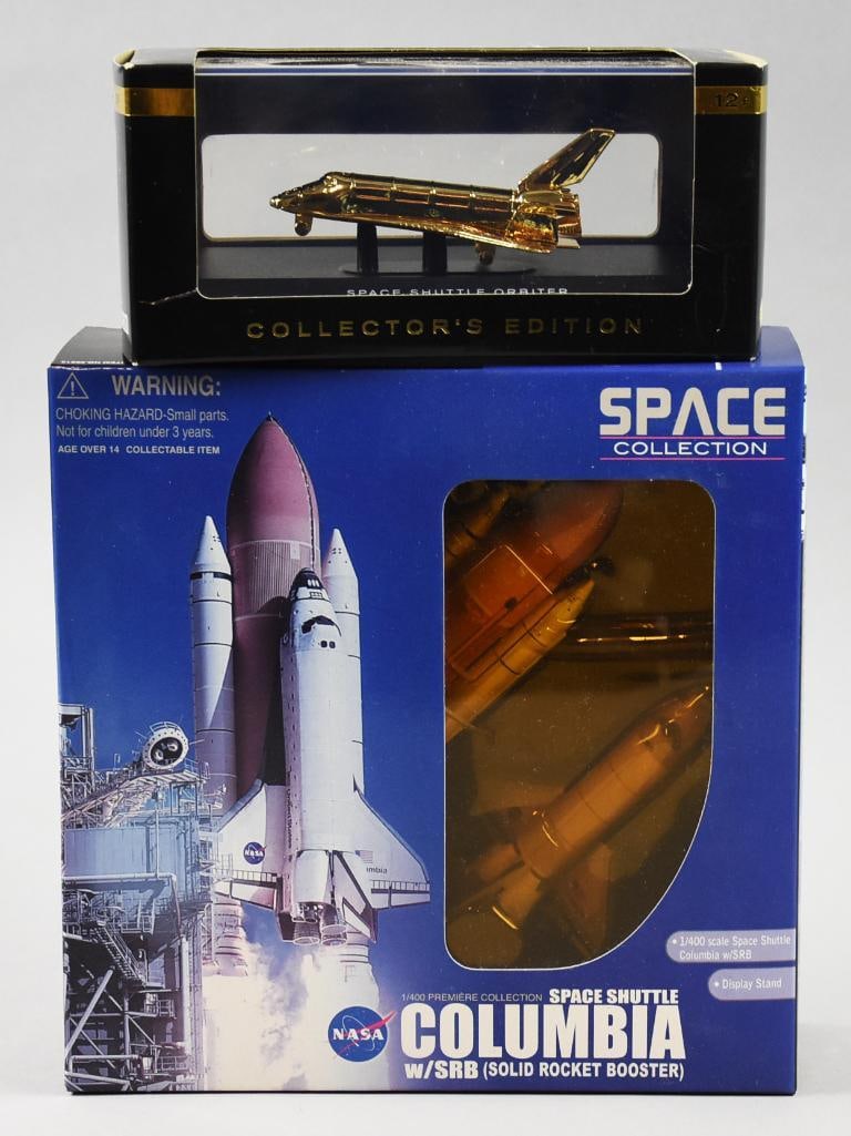 (2) 2011 Dragon Models, Smithsonian Space Shuttles-MIB-NOS: Lot is two 2011 Dragon Models, Smithsonian Space Shuttles-MIB-NOS. Lot is the Space Shuttle Columbia by Dragon Models and a Shuttle Orbiter, 24K gold plated from the Smithsonian. Single owner collecti