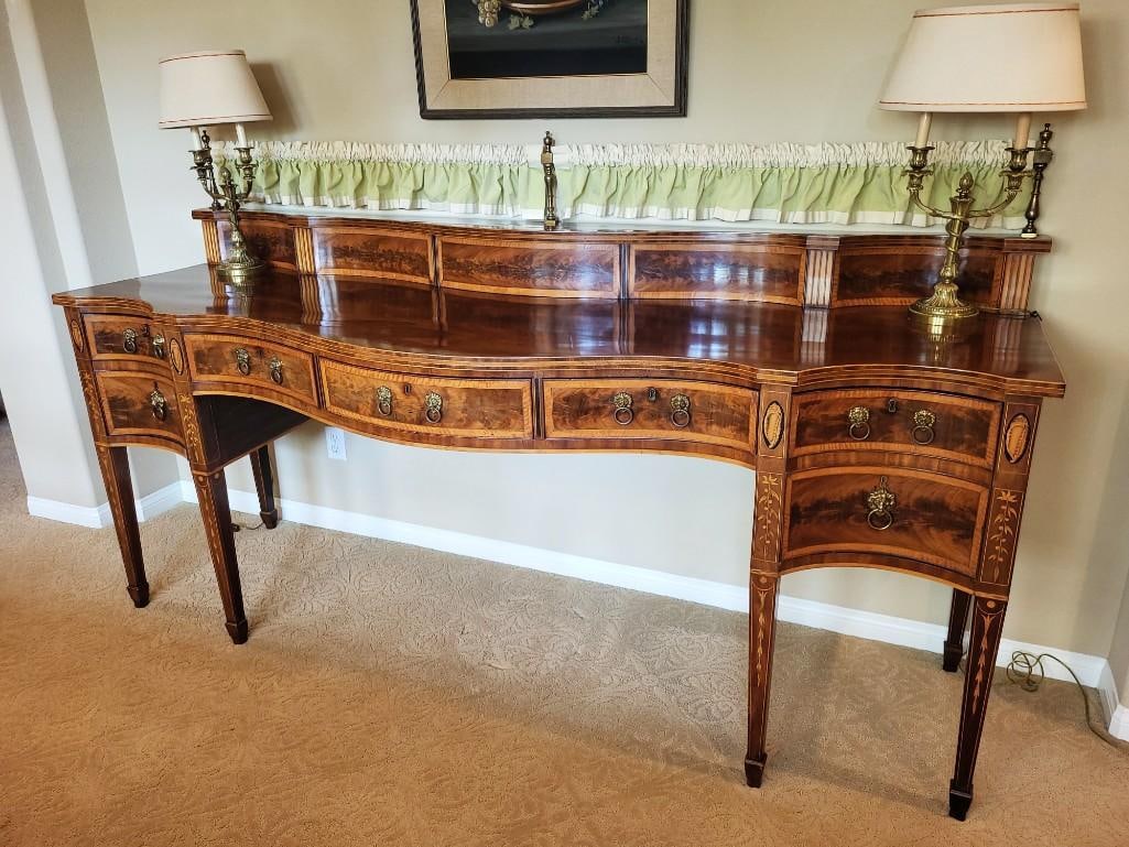 c1780 George III flame figured mahogany and satinwood sideboard.: A George III (1715-1830) flame figured mahogany and satinwood crossbanded and inlaid serpentine fronted sideboard. This handsome sideboard appears to be of British manufacture. Inlaid throughout with 
