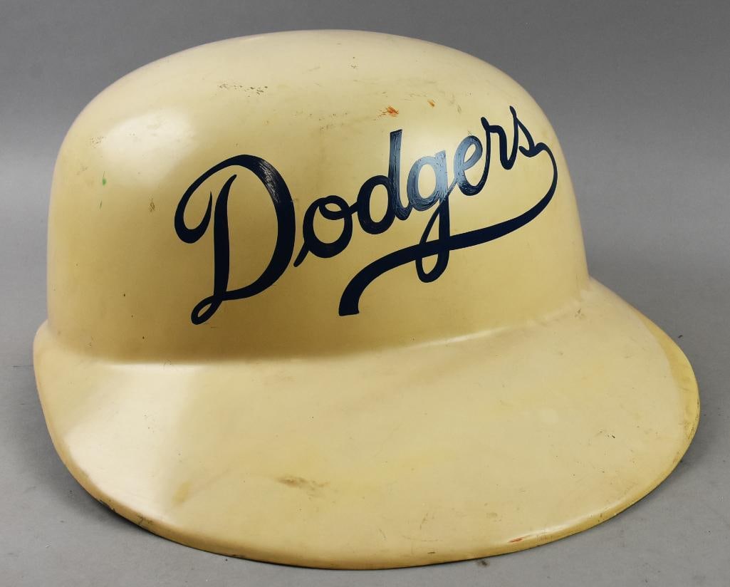 Vintage OVERSIZED Los Angeles Dodgers Batting Helmet: This is a very fun vintage Los Angeles Dodgers batting helmet. Hard materials with hand painted team logo on front. This helmet may be for a farm team or other young team who took on the Dodger's name